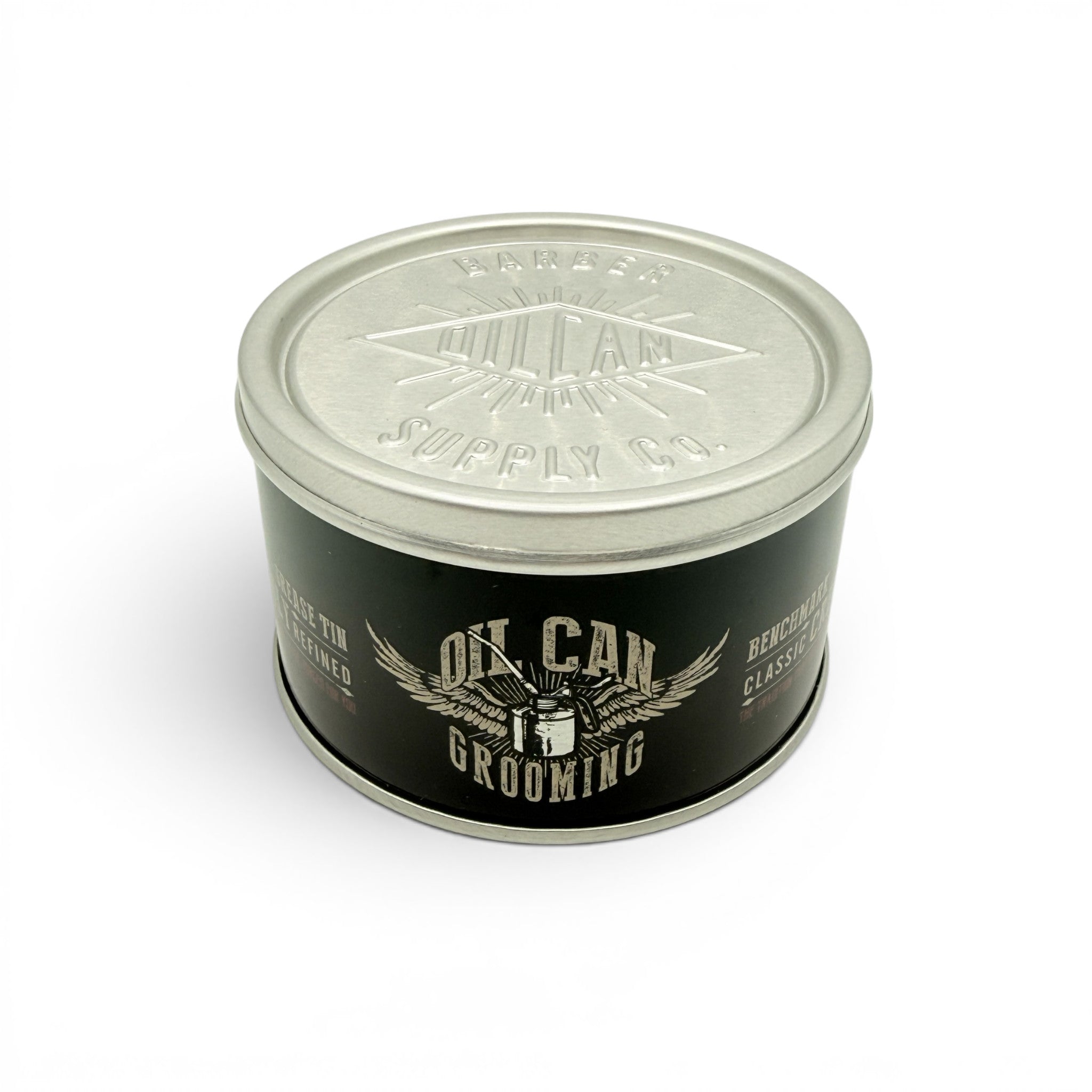 Oil Can Grooming's Benchmark Classic Hair Cream tin with vintage style grooming design on white background