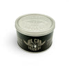 Oil Can Grooming's Benchmark Classic Hair Cream tin with vintage style grooming design on white background