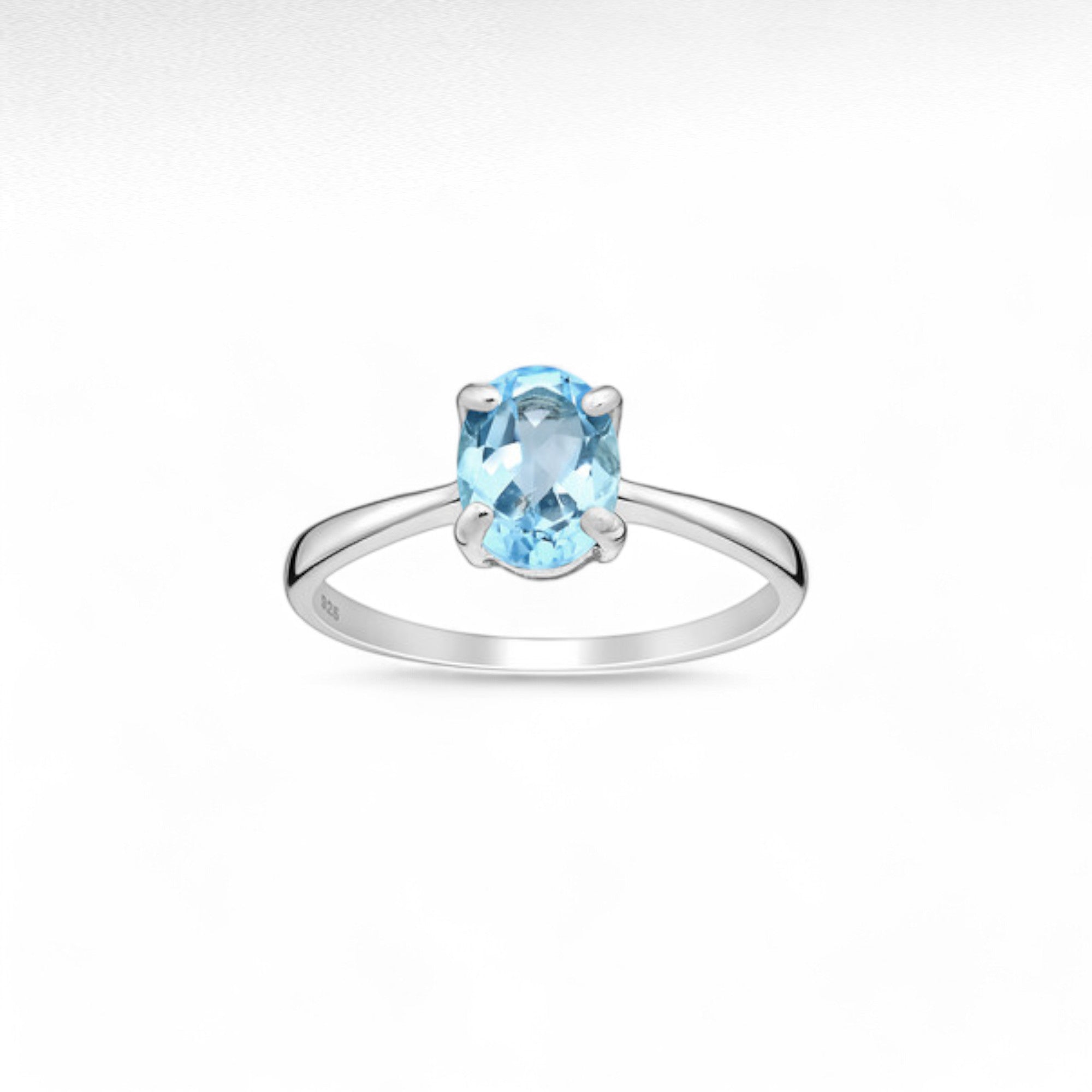 Sterling Silver Solitaire Ring Decorated with Topaz