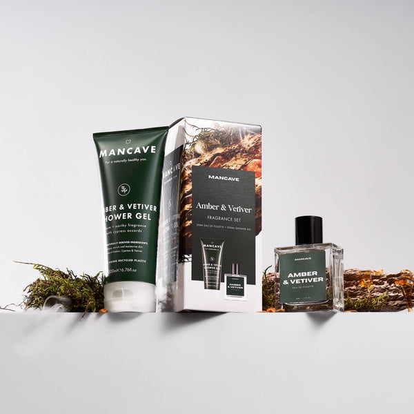 ManCave Amber & Vetiver Shower Gel and Eau de Toilette Gift Set displayed with matching grooming products.
