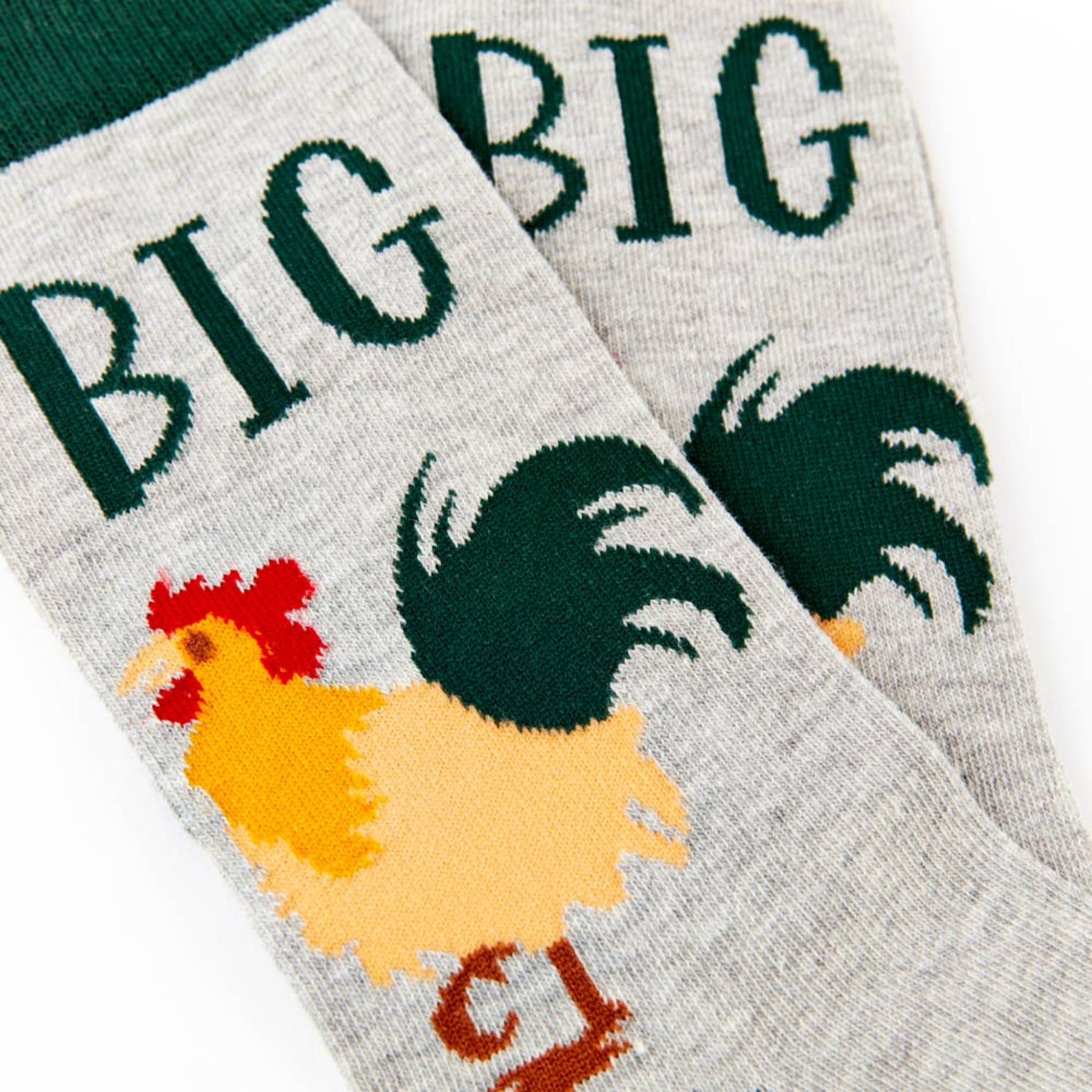 close up of Big Cock socks showing rooster design and text