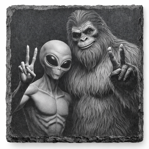 Laser engraved Bigfoot and alien slate coaster on natural slate