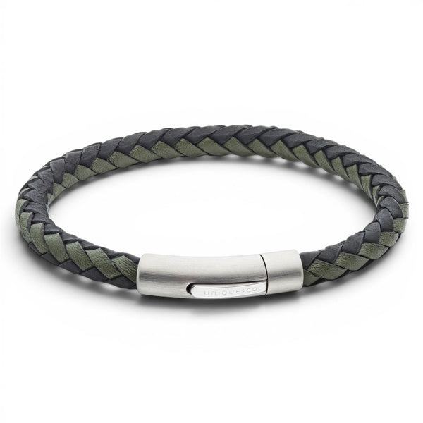 Black and dark green braided leather bracelet with stainless steel clasp on a white background