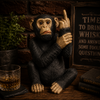 Black resin monkey ornament with raised middle finger styled in a warm rustic home bar interior