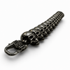Close up of black IP plated stainless steel skull bracelet trigger clasp and skull links