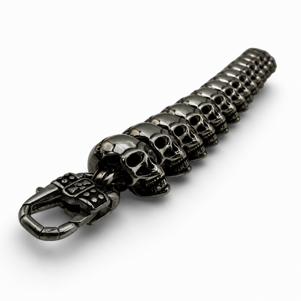 Close up of black IP plated stainless steel skull bracelet trigger clasp and skull links