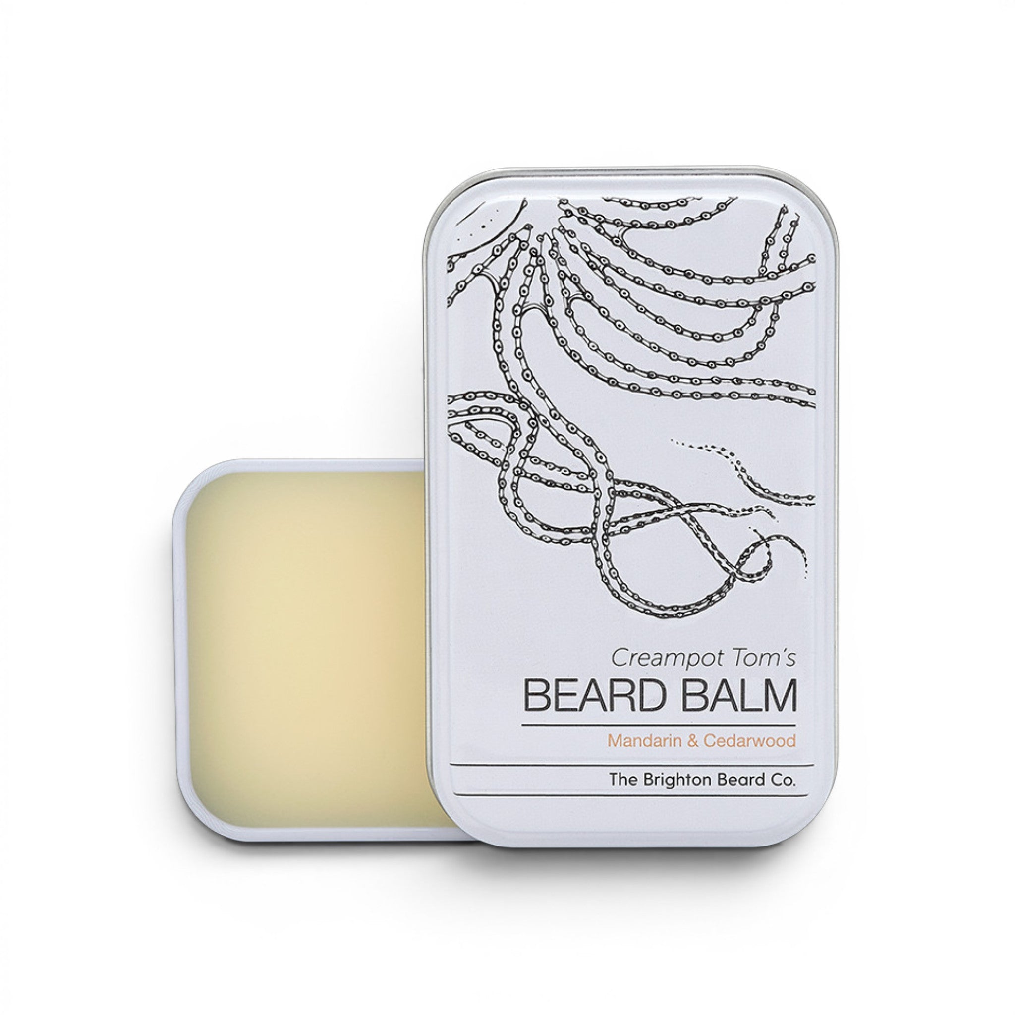 Open tin of The Brighton Beard Co. Mandarin and Cedarwood Beard Balm showing the conditioning balm inside