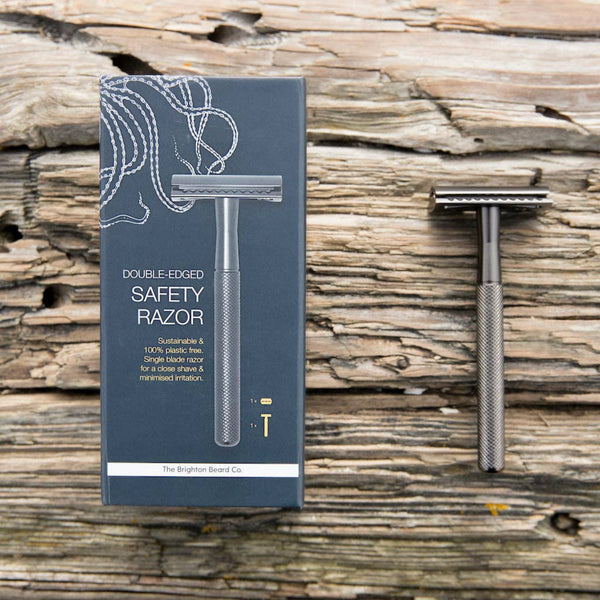 Brighton Beard Company safety razor with packaging on rustic wooden surface