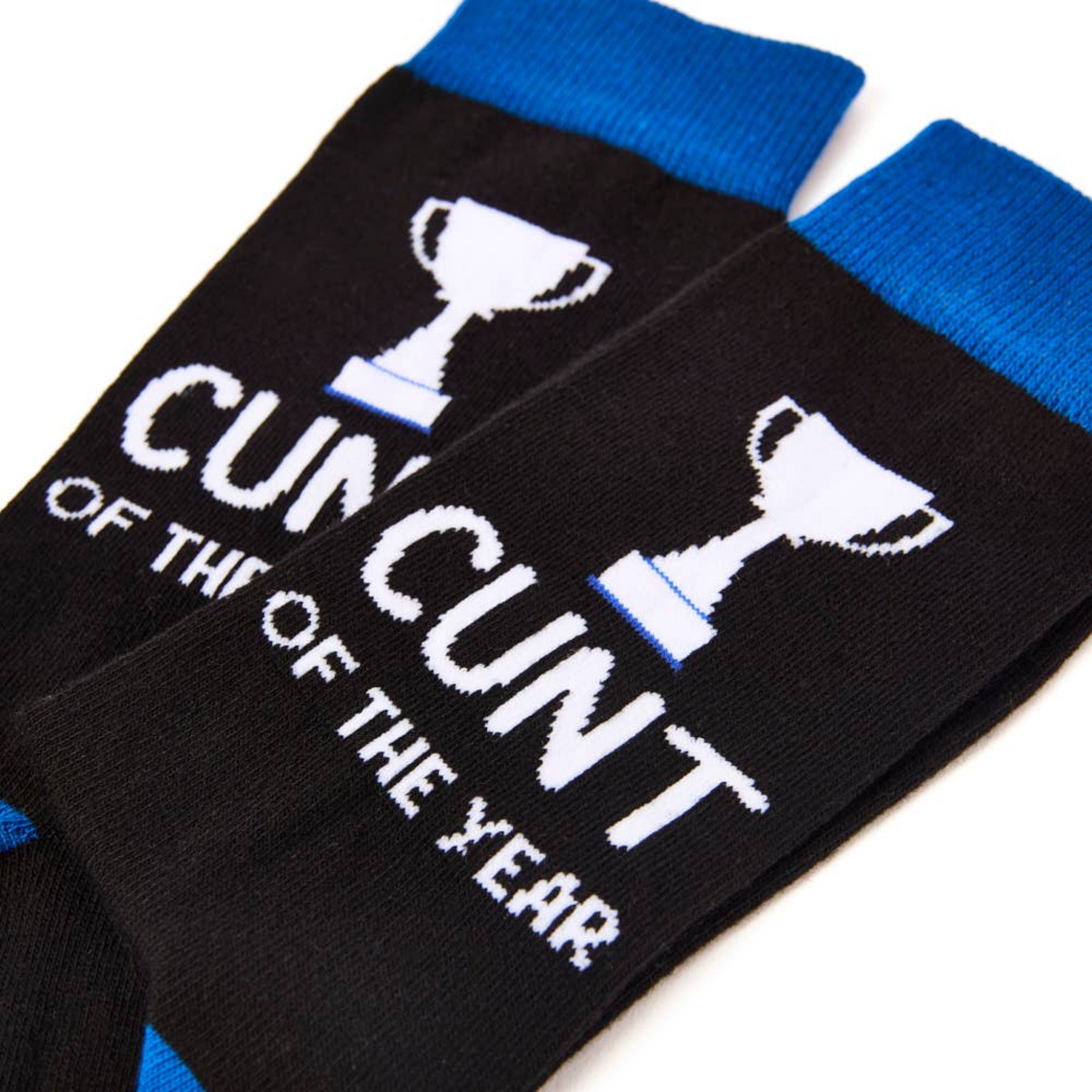 Close up of trophy graphic and c u next tuesday text on socks