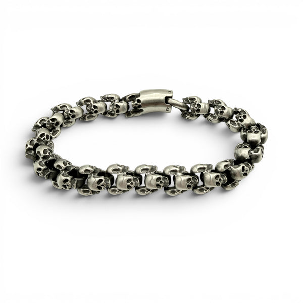 Chunky brushed stainless steel skull bracelet with matte finish and detailed skull links