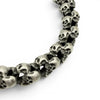 Close up of brushed skull bracelet showing matte finish and skull link detail