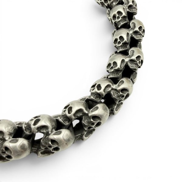 Close up of brushed skull bracelet showing matte finish and skull link detail