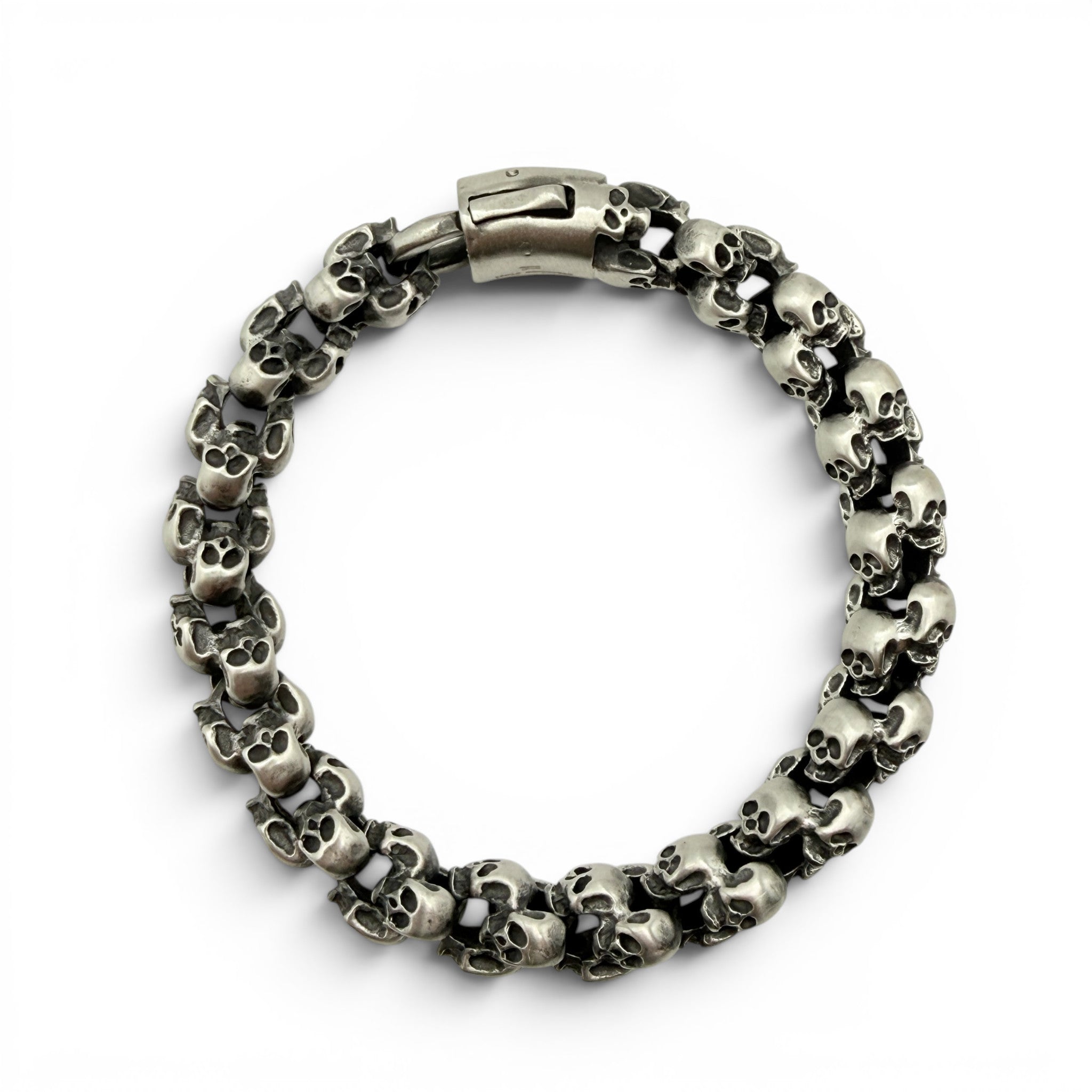 Full view of chunky brushed skull bracelet showing complete skull link design