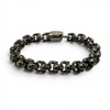 Chunky oxidised stainless steel skull bracelet with detailed skull links and secure clasp