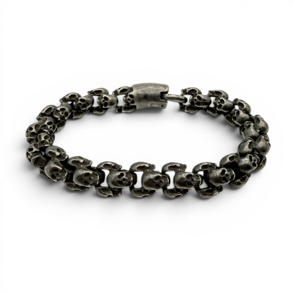 Chunky oxidised stainless steel skull bracelet with detailed skull links and secure clasp