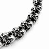 Close up angled view of chunky polished skull bracelet showing skull link detail