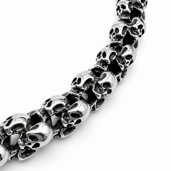 Close up angled view of chunky polished skull bracelet showing skull link detail