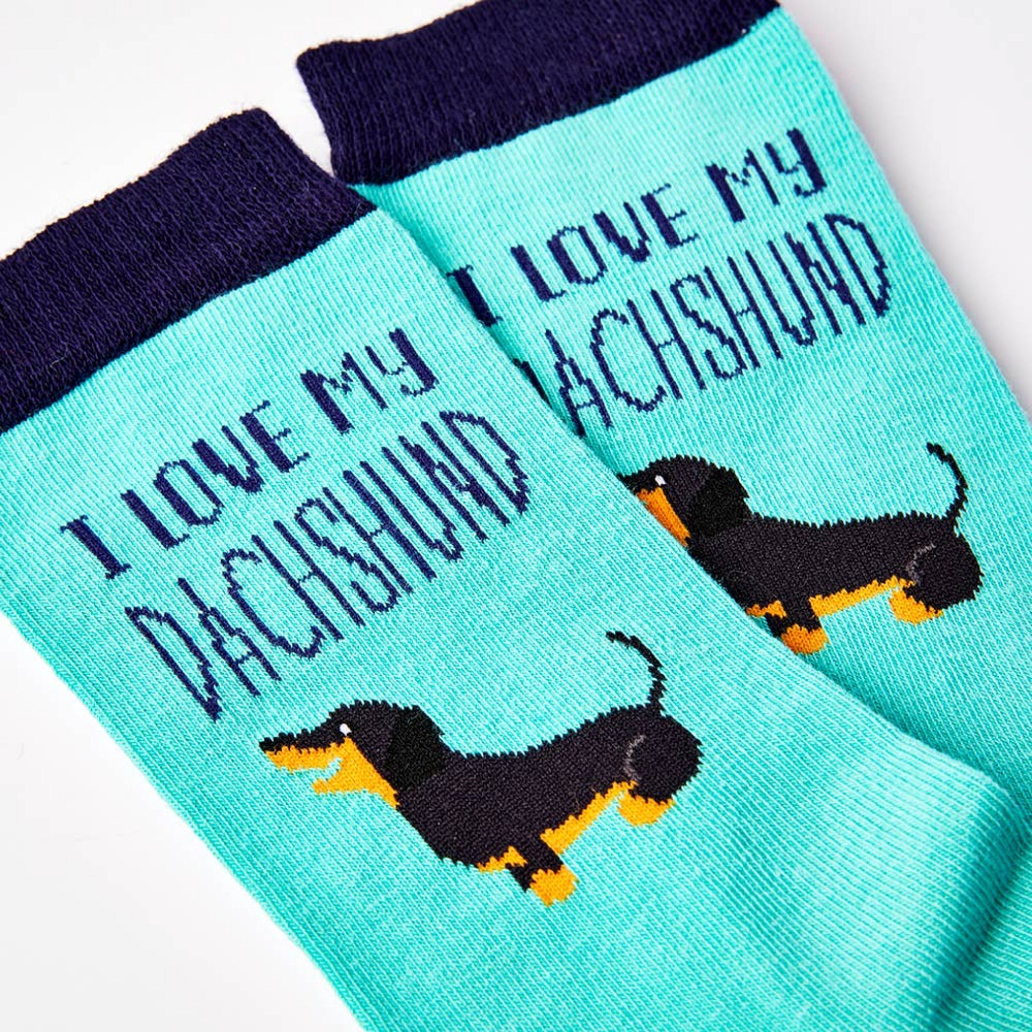 close up of I Love My Dachshund socks showing dog design and text