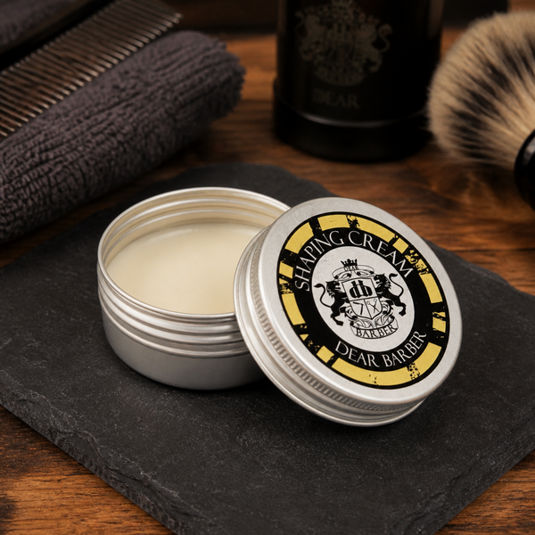 Dear Barber Shaping Cream 20ml open styling cream tin in classic barber shop lifestyle scene with grooming accessories