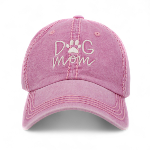 Pink washed vintage Dog Mom baseball cap with embroidered front lettering and curved peak.