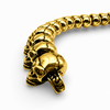 Gold skull link bracelet showing detailed skull links from the side