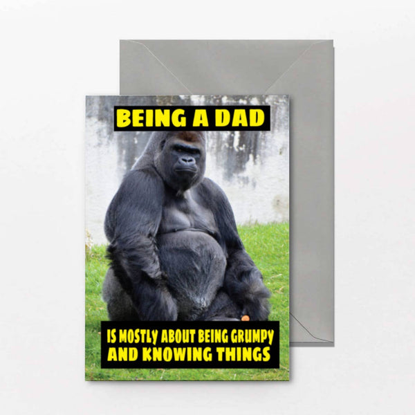 Funny Father's Day greeting card featuring a grumpy gorilla with the caption "Being a Dad is mostly about being grumpy and knowing things"