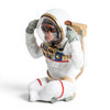 White astronaut chimpanzee resin ornament covering ears isolated on white background