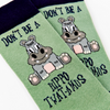 close up of Hippo-Twat-Amus socks showing hippo design and text