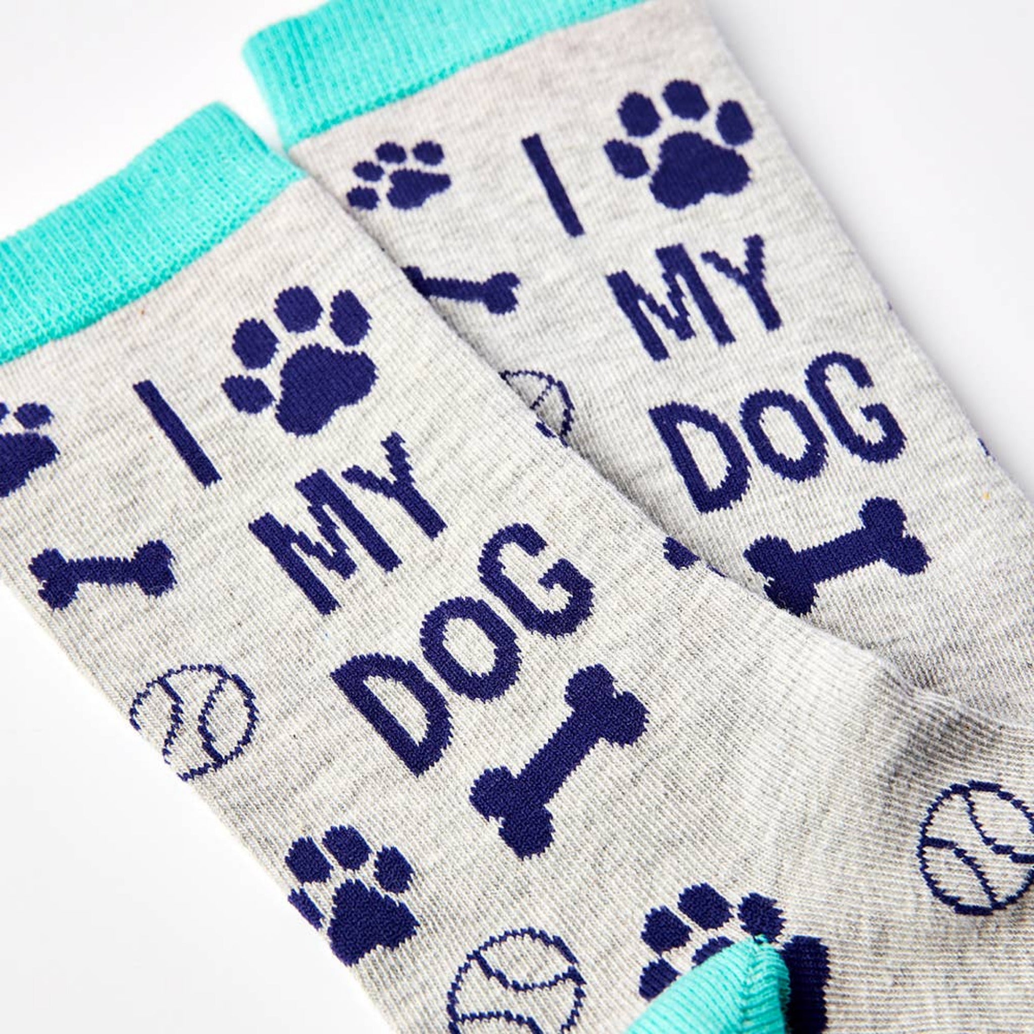 close up of I Love My Dog socks showing paw print design and text