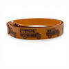 Brown leather belt with engraved Land Rover design and metal buckle on white background