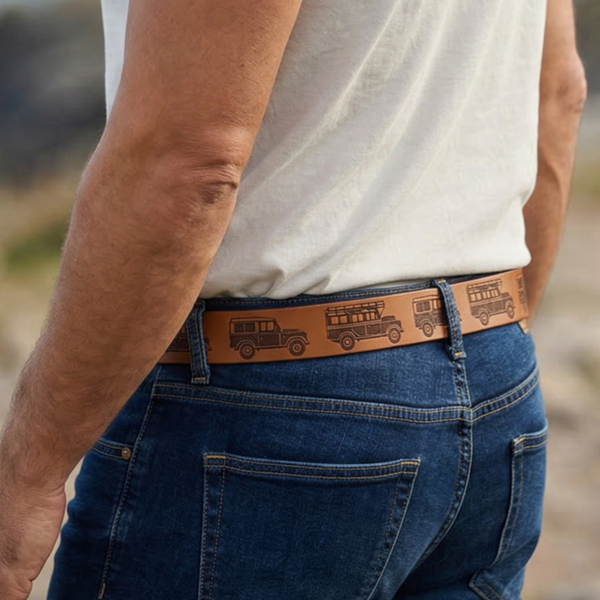 rown leather belt with engraved Land Rover design worn with blue jeans