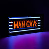 Man Cave glass neon sign with red and blue glow inside a clear acrylic display box