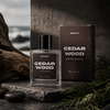 Mancave Cedarwood Eau De Toilette in a moody coastal spa inspired lifestyle scene with dark stone textures and cedar accents