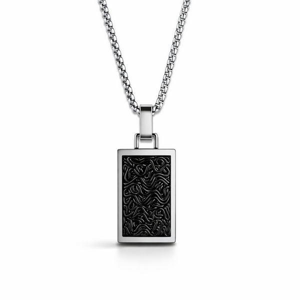 Men’s stainless steel rectangular pendant necklace with black textured inlay on a 20inch chain, isolated on a white background with soft shadow
