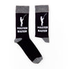 Pair of black novelty socks with grey trim featuring fishing themed slogan design