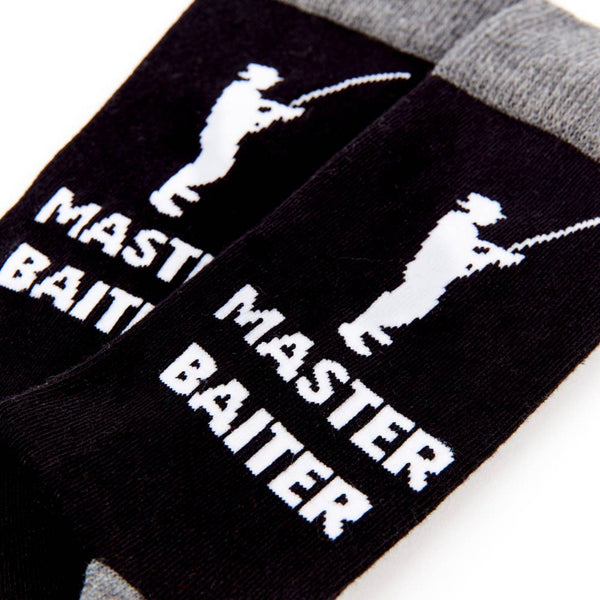 Pair of black novelty socks with grey trim featuring fishing themed slogan design