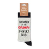 Grey novelty grumpy club socks shown with retail tag attached