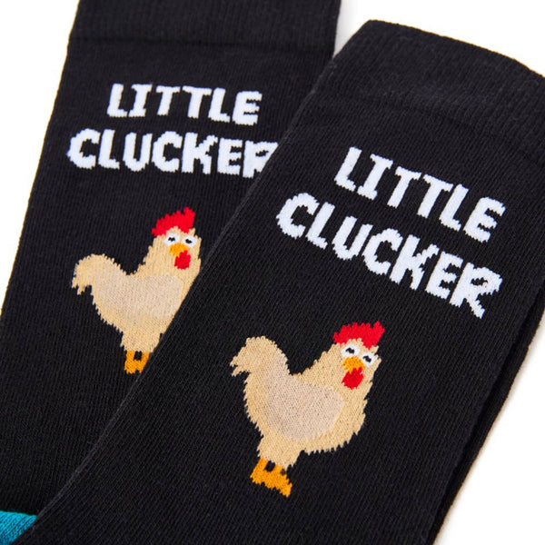 Close up of little clucker slogan and design on novelty socks