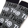 Close up of Tw@ text pattern on men’s novelty socks