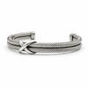 Angled view of men’s sterling silver double rope cuff bracelet showing twisted strands and polished crossover