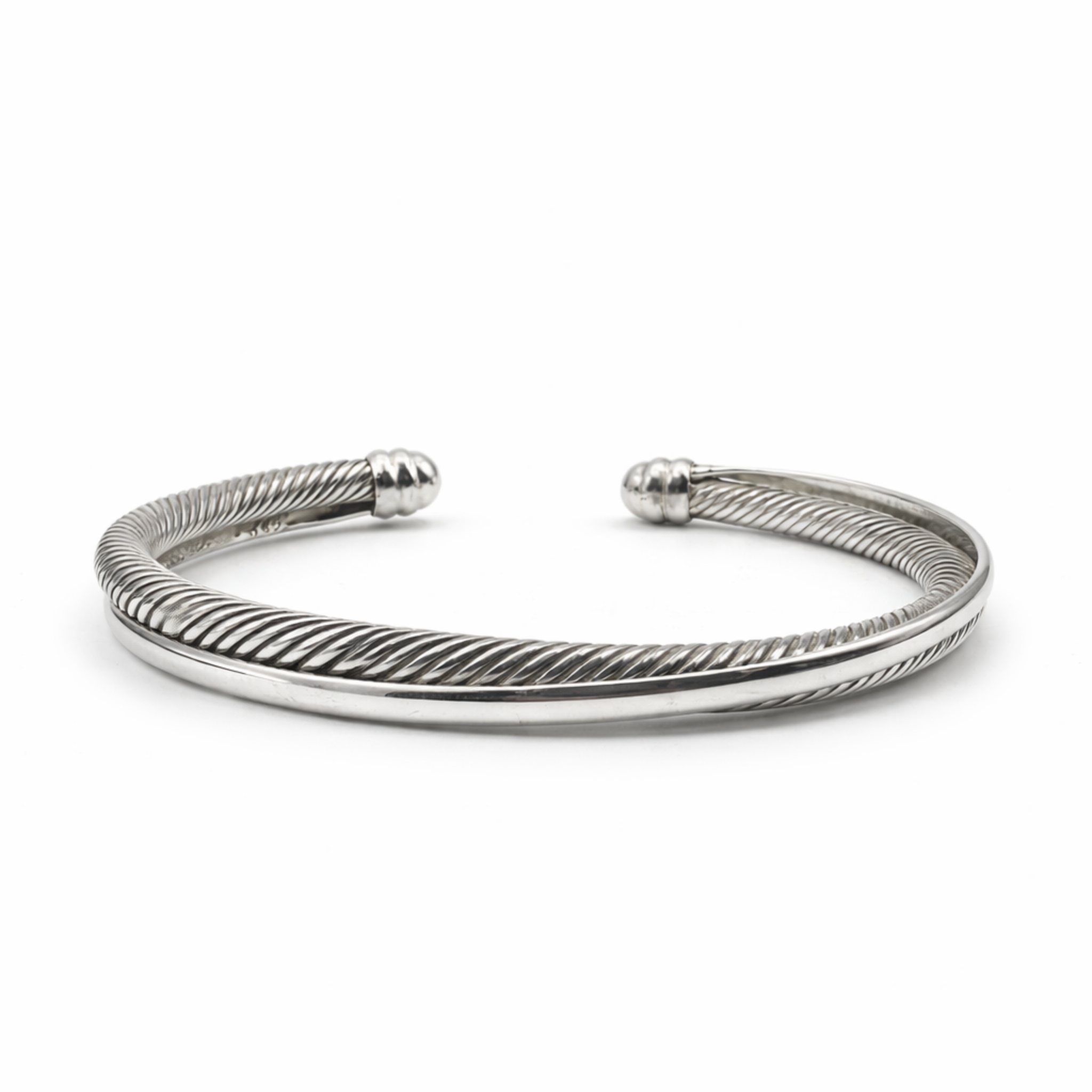 top view of men’s sterling silver twisted torque cuff bracelet showing rope detail and smooth band