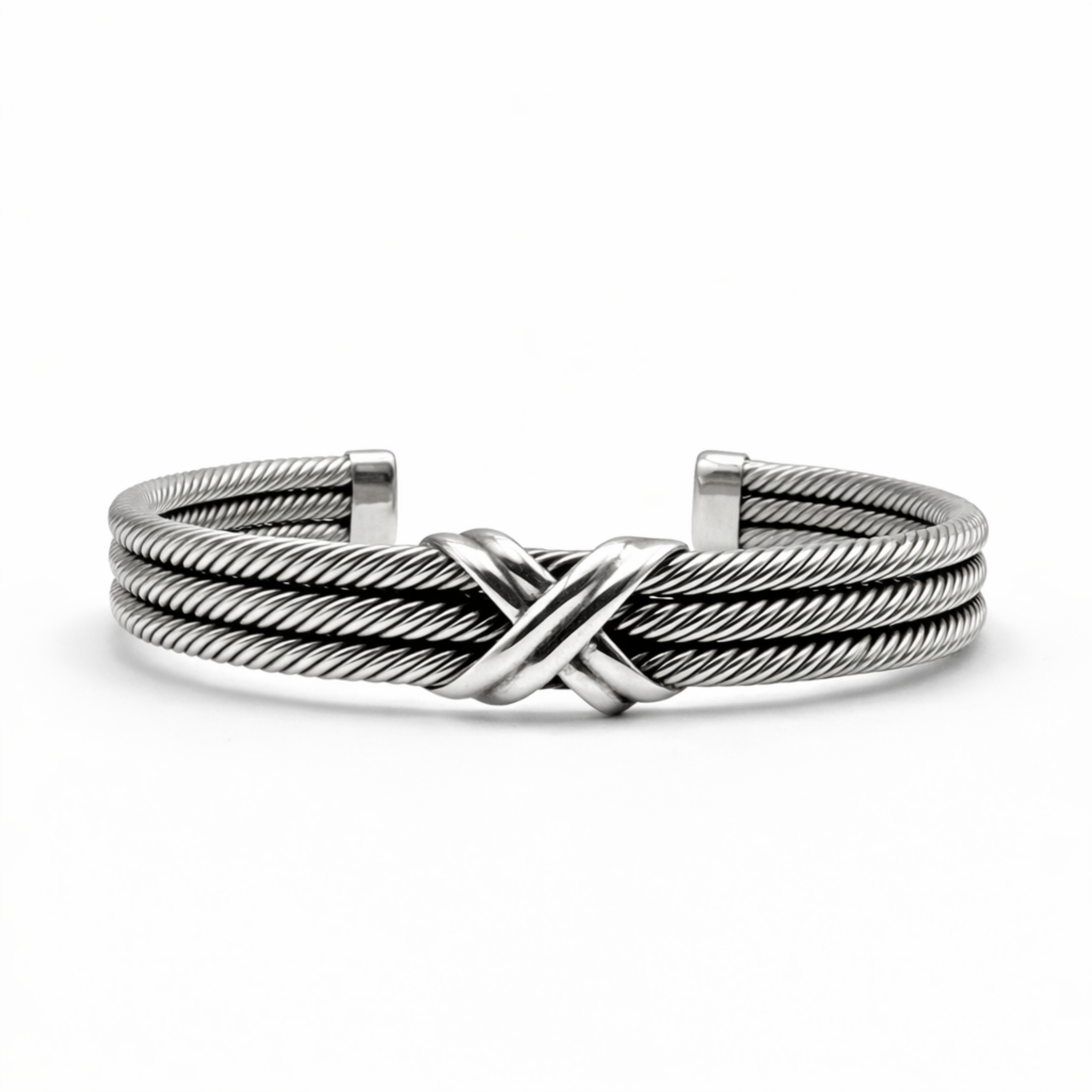 Men’s sterling silver cuff bracelet with triple rope crossover detail on white background