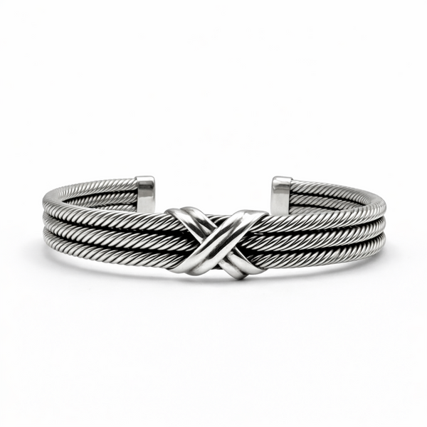 Men’s sterling silver cuff bracelet with triple rope crossover detail on white background