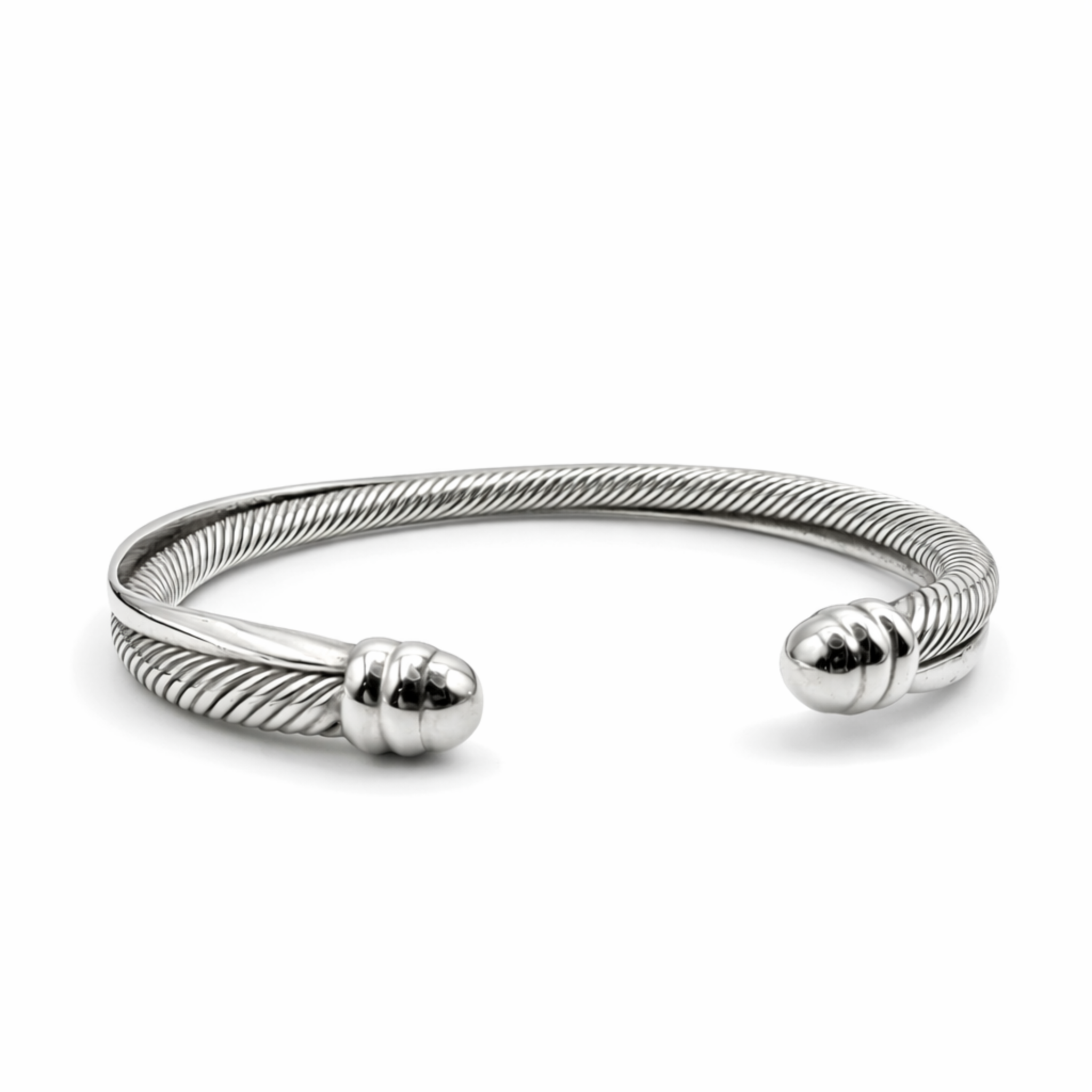 Men’s sterling silver twisted cuff bracelet with polished end caps on white background