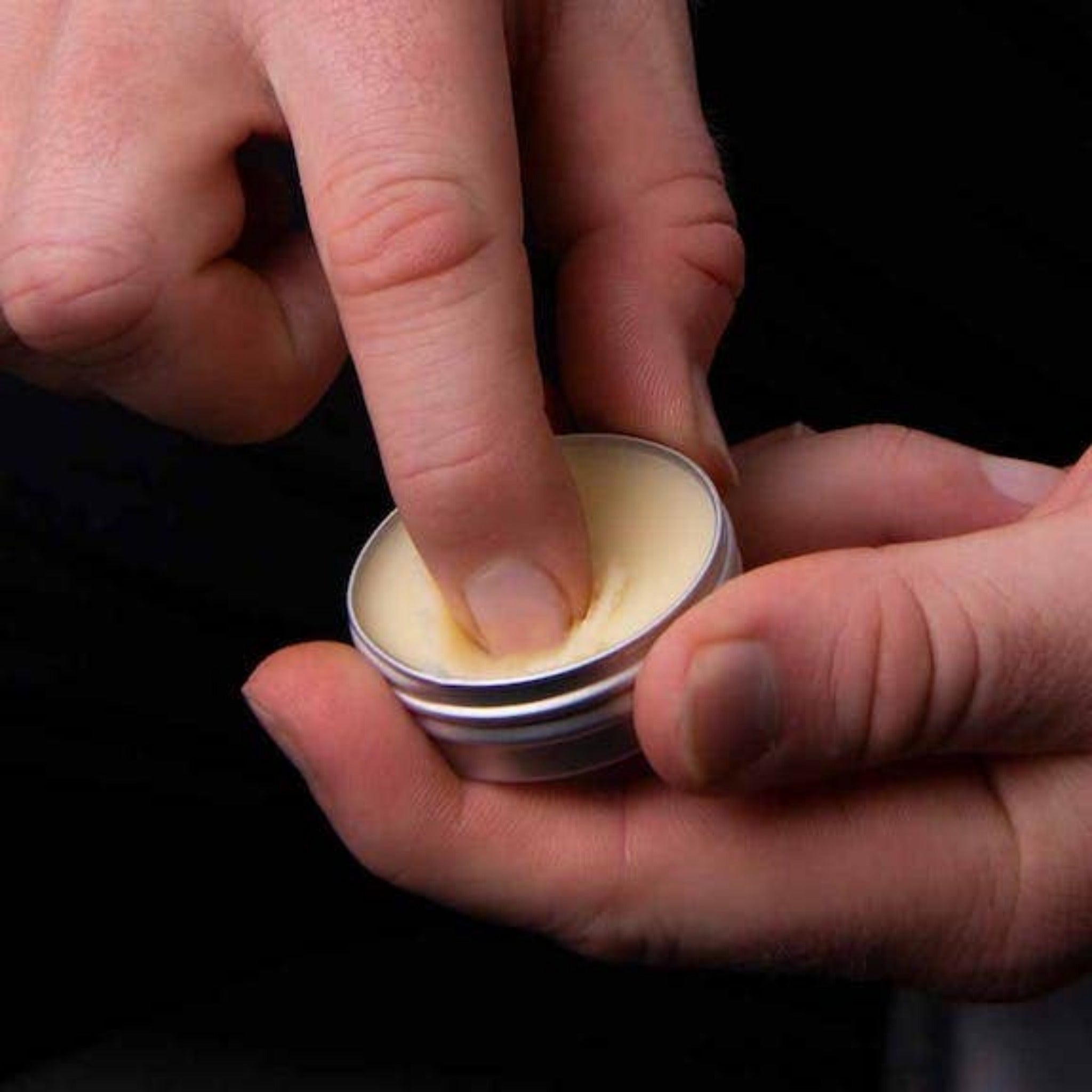Applying Mo Bros Vanilla & Mango Beard Balm 25ml by fingertip