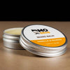 Open tin of Mo Bros Vanilla & Mango Beard Balm 25ml with natural balm texture