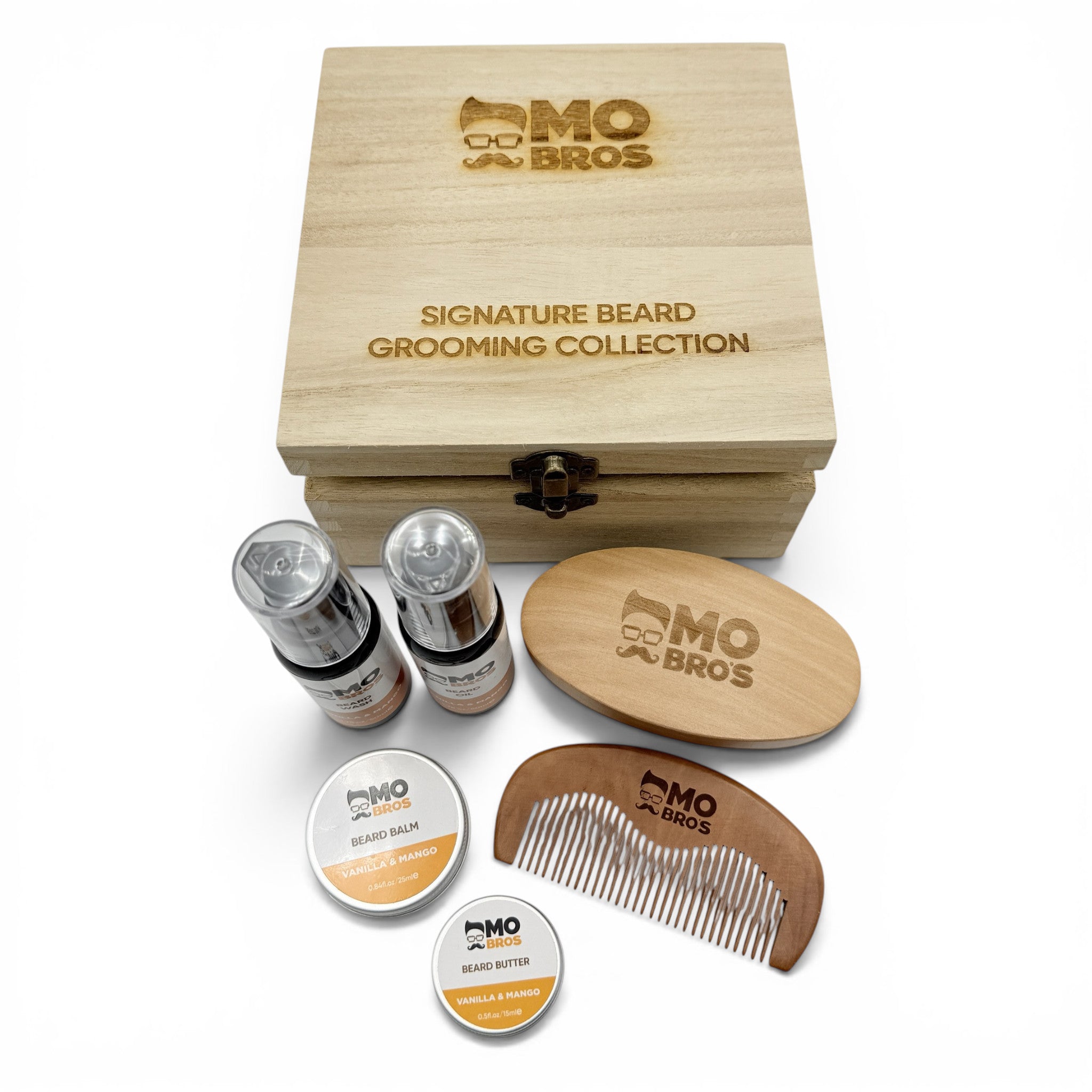Mo Bros vanilla and mango beard grooming gift set displayed with wooden presentation box and grooming accessories