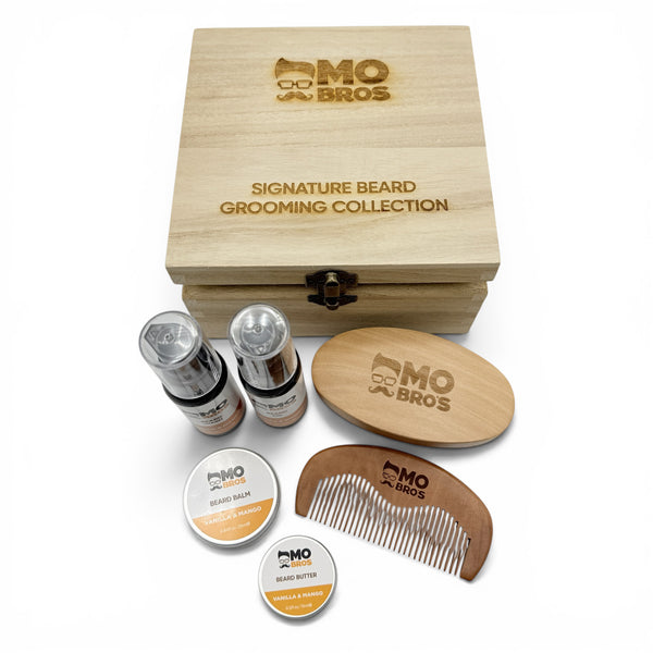 Mo Bros vanilla and mango beard grooming gift set displayed with wooden presentation box and grooming accessories