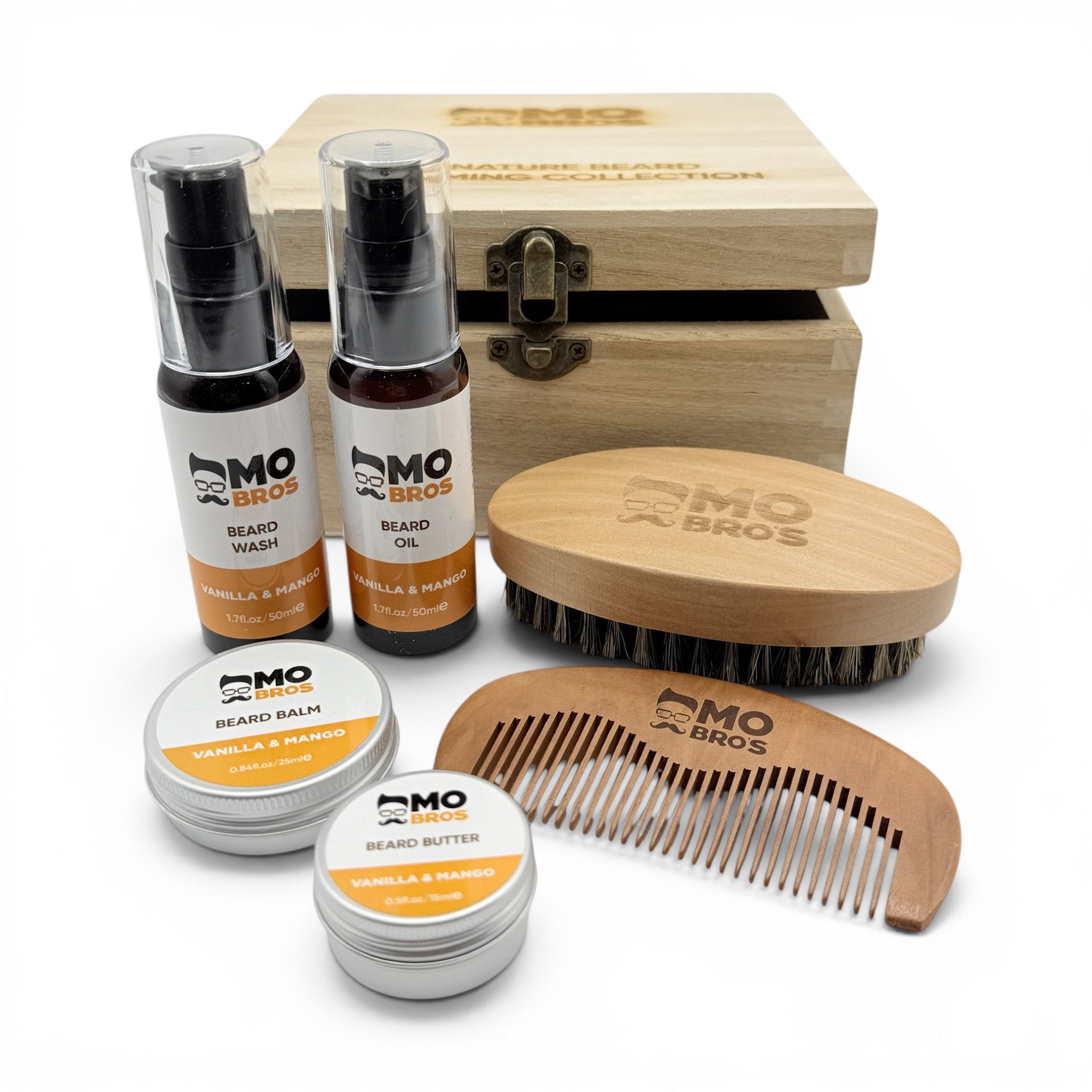 Mo Bros vanilla and mango beard grooming gift box with beard oil, beard wash, balm, butter, brush and comb on white background