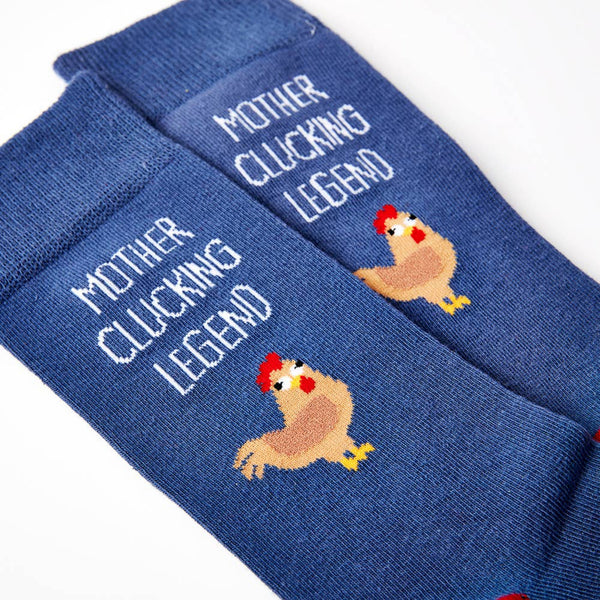close up of Mother Clucking Legend socks showing chicken design and text